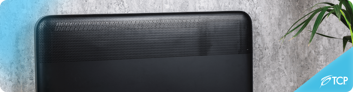 A panel heating mounted on a grey wall