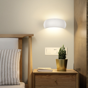 TCP White Up Down Style Indoor Wall Light IP20 on a bedroom wall
