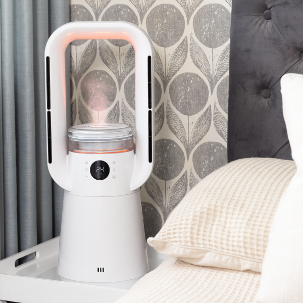 An white air circulator on the bed stand
