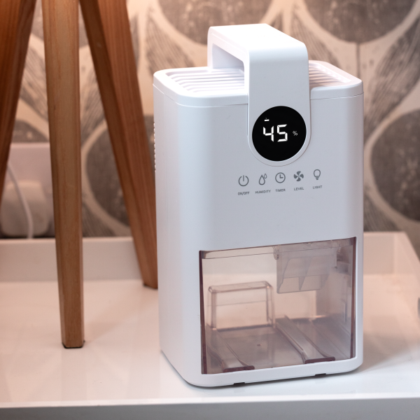A TCP mini dehumidifier in a sitting room ideal for home and small spaces