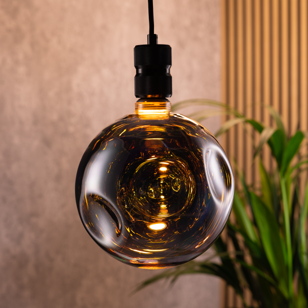 An indescent decorative LED bulb hanging in the living room