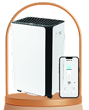 A smart dehumidifier with a mobile phone beside it